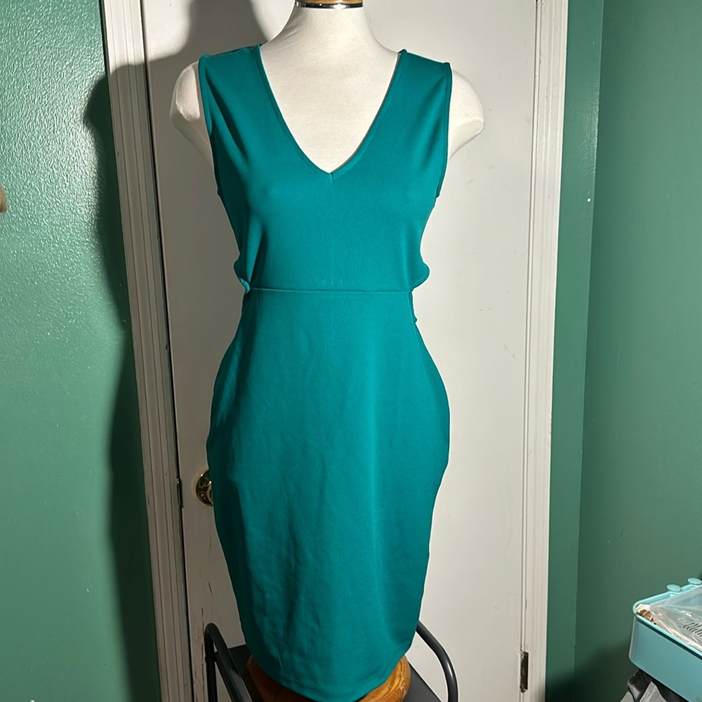 Charlotte Russe teal dress with side cut outs size large